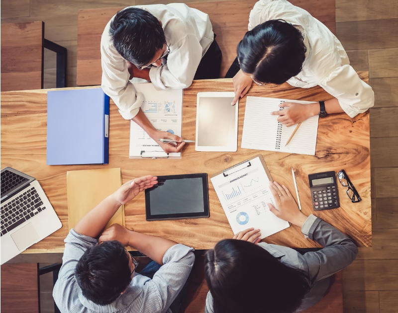 Team of accountants working on bookkeeping and reporting